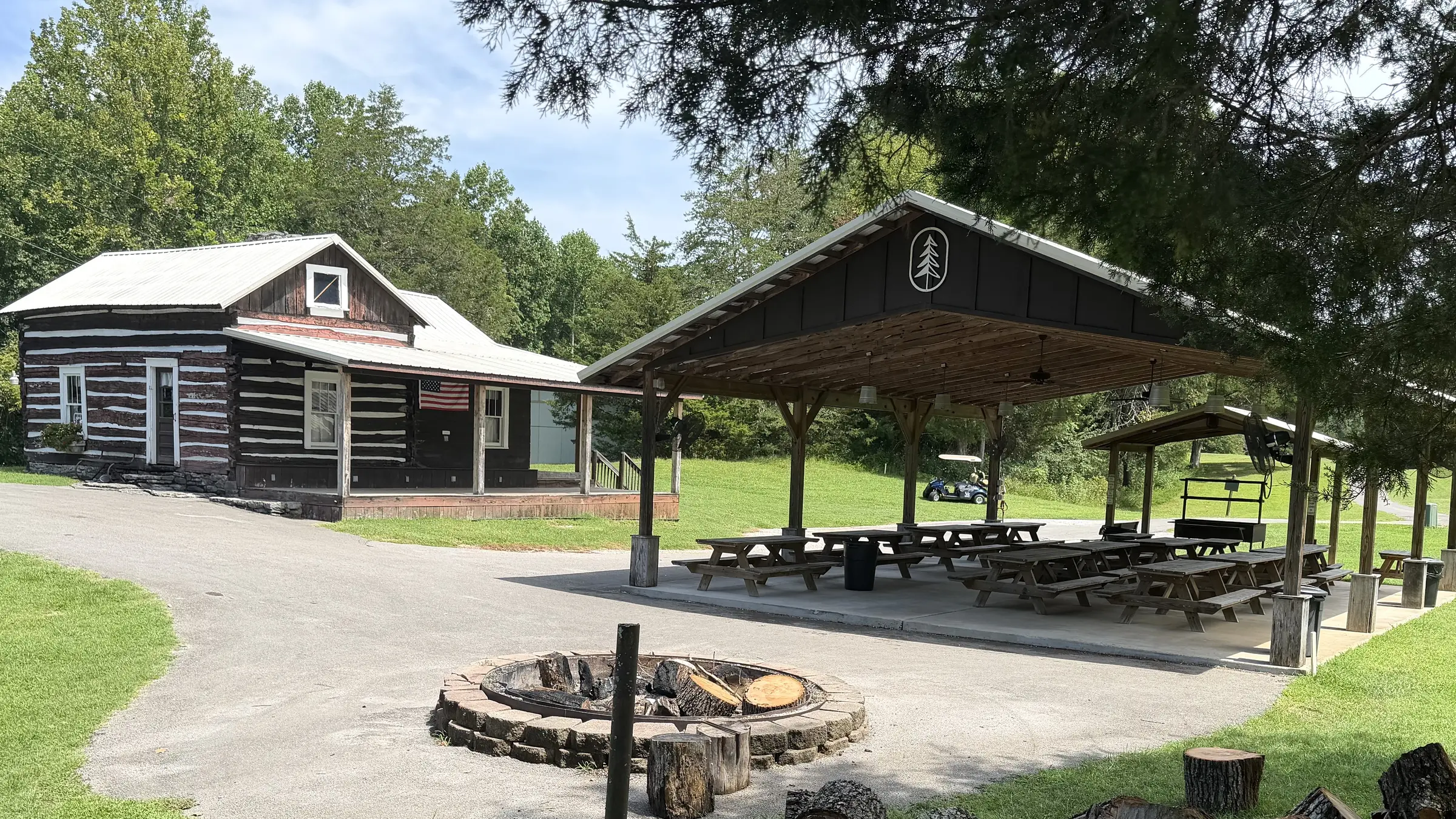 Shared fire pit and covered picnic pavilion at Woodson Bend